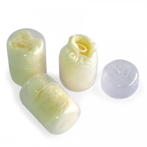 Pair of vinyl gloves in PET capsule container